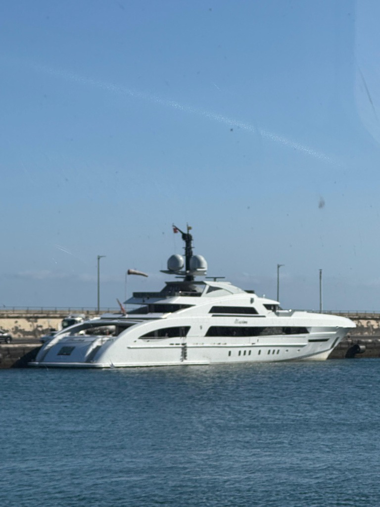 Megayacht berthing Santa Cruz quay